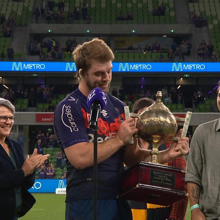 Christian Welch is presented with the Michael Moore trophy